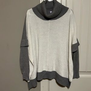 Gray and white sweater